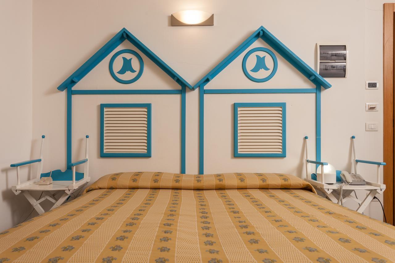 Hotel Resort Marinella กาบิชเชมาเร ภายนอก รูปภาพ